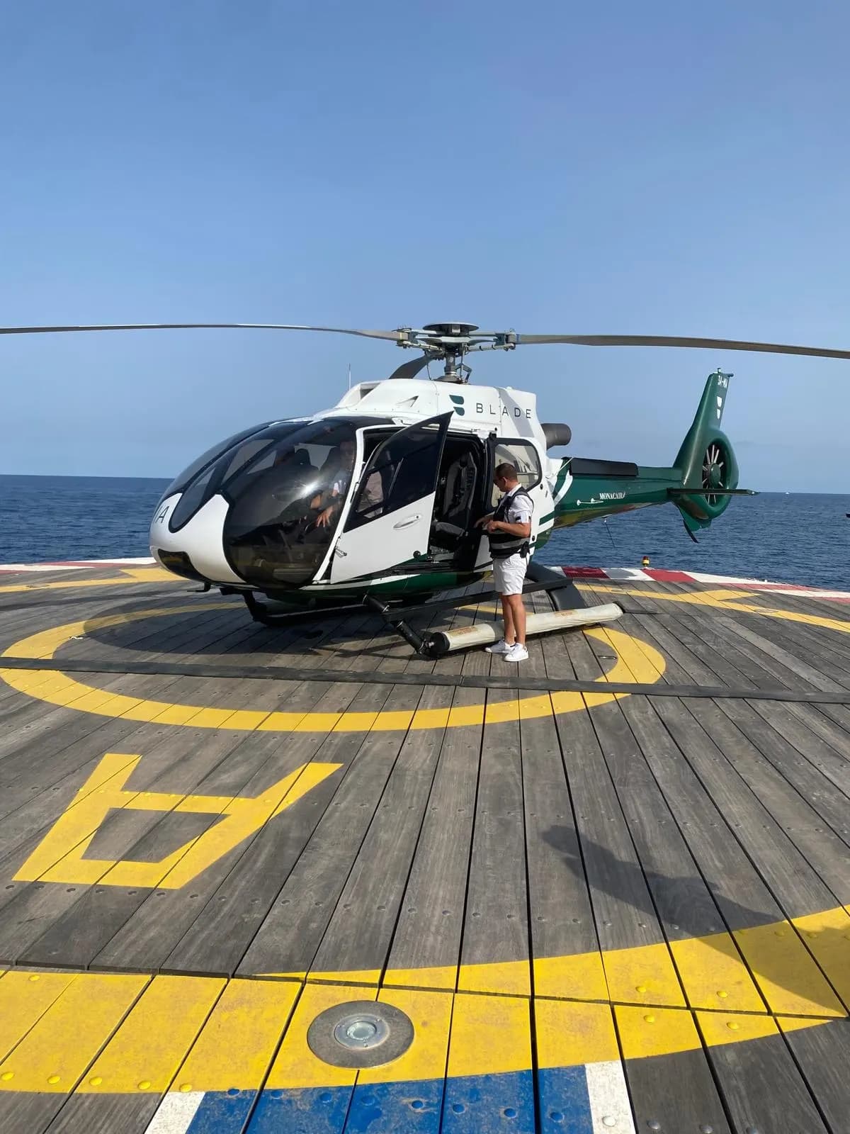 Helicopter on a seaside helipad
